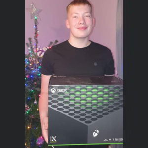 Simon Brookes (son pictured) - Xbox Series X Winner
