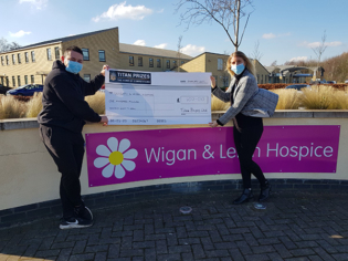 Wigan & Leigh Hospice £100 Donation from Titan Prizes' January Charity Draw
